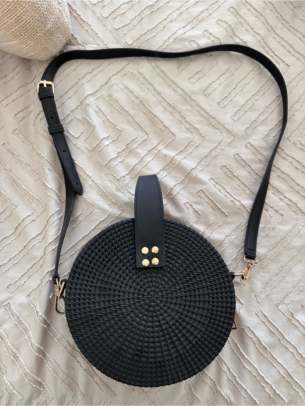 Black Woven Round Crossbody Bag with Gold Accents